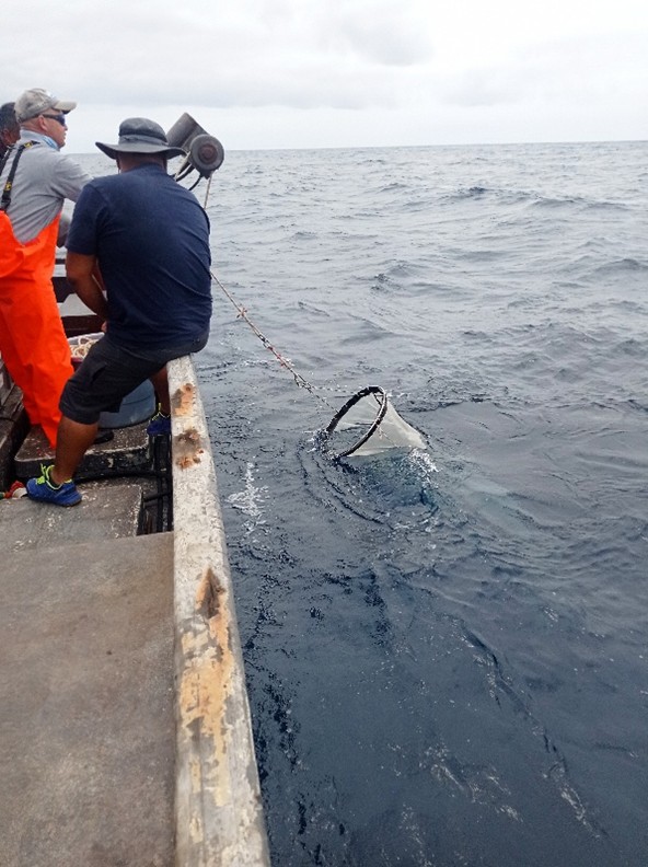 Scientists retrieving SHOTS plankton net