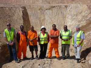 HG Health and Social Welfare Team with new Waste Cell in the background