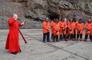 Bishop Fenwick Blesses the Boats and their Crews