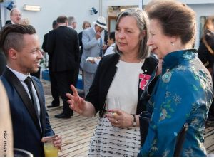 Neil meeting HRH The Princess Royal onboard the RMS in London